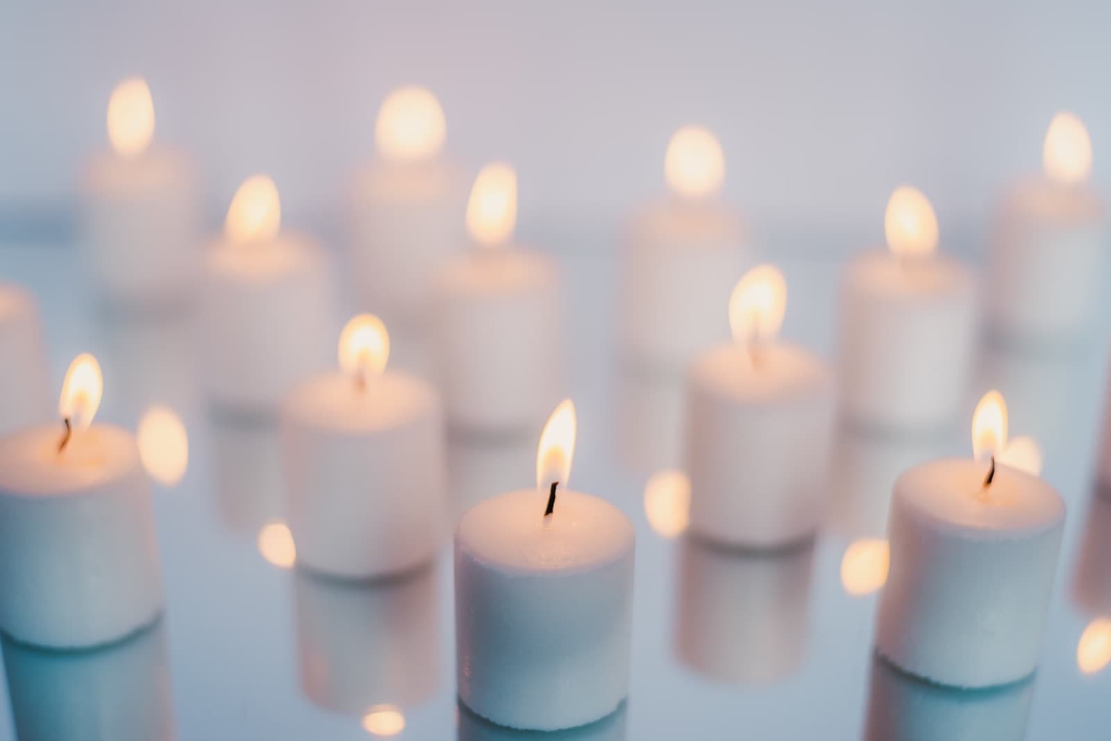 Softly glowing candles — a space to remember and grieve